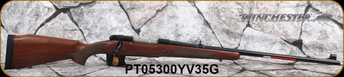 Winchester - 375H&H - Model 70 Alaskan - CRF bolt-action - Black Walnut Monte Carlo Stock/Blued, 25"Barrel, Hinged Floorplate, Folding adj. rear sight, hooded brass bead front, M.O.A. Trigger System, Mfg# 535205138, S/N PT05300YV35G