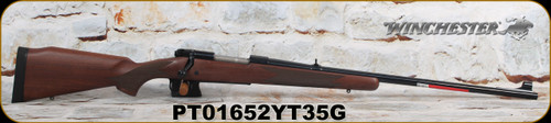 Winchester - 338WinMag - Model 70 Alaskan - CRF bolt-action - Black Walnut Monte Carlo Stock/Blued, 25"Barrel, Hinged Floorplate, Folding adj. rear sight, hooded brass bead front, M.O.A. Trigger System, Mfg# 535205136, S/N PT01652YT35G
