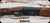 Used - Fabarm - 12Ga/3"/30" - Elos Trap - O/U - Walnut Stock w/Adjustable Comb/Engraved Receiver/Blued, vent-rib barrels, c/w (3)Exis HP chokes - in original hard case