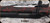 Consign - HS Precision - 220Swift - Pro Series Model 2000 SA - Black w/Red Web HS Precision Stock/Black Cerakote Finish, 26"Fluted Barrel, c/w Muzzle Brake