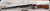 Caesar Guerini - 12Ga/2.75"/32"- Invictus I Sporting - Select Walnut Monte Carlo stock w/DTS adjustable comb & Semi-beavertail forend/Engraved Nickel Receiver w/Invisalloy protective finish/Blued Barrels, Mfg# A02191 S/N 191401