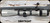 Consign - Weatherby - 257WbyMag - Mark V - Grey w/Black Web Synthetic Stock/Two Tone Spum Stainless & Graphite Cerakote, 26"Fluted Barrel, c/w Zeiss Conquest 4.5-14x44 MC, plex reticle