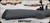 Consign - Weatherby - 257WbyMag - Mark V - Grey w/Black Web Synthetic Stock/Two Tone Spum Stainless & Graphite Cerakote, 26"Fluted Barrel, c/w Zeiss Conquest 4.5-14x44 MC, plex reticle