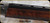 Consign - Remington - 12Ga/2.75"/28" - Model 1100 Premium Sporting 12 - Grade AA Gloss Walnut Stock/Engraved Nickel Receiver/Blued Barrels, c/w (2)chokes Carlson LM & Skeet - in Green Remington Hard case