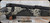 Used - Weatherby - 7mmBackcountry - Mark V Backcountry Guide - Peak 44 Blacktooth Exposed carbon fiber w/Olive Green & backpack sponge pattern accents/BSF Carbon Barrel, 20", Mfg# MGS01N7MMBR2B - NIB