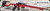 Consign - Anschutz - 22LR - Model 1727 Match - Fire Red AI AT-X Chassis w/AI Picatinny 30 MOA Rail(.900) 23"Heavy Barrel, Threaded 5020 Match Trigger (Mfg# 016793AIFR) - New, unfired in original case - c/w Picatinny Bipod mount