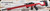 Consign - Anschutz - 22LR - Model 1727 Match - Fire Red AI AT-X Chassis w/AI Picatinny 30 MOA Rail(.900) 23"Heavy Barrel, Threaded 5020 Match Trigger (Mfg# 016793AIFR) - New, unfired in original case - c/w Picatinny Bipod mount