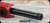 Consign - Anschutz - 22LR - Model 1727 Match - Fire Red AI AT-X Chassis w/AI Picatinny 30 MOA Rail(.900) 23"Heavy Barrel, Threaded 5020 Match Trigger (Mfg# 016793AIFR) - New, unfired in original case - c/w Picatinny Bipod mount