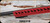 Consign - Anschutz - 22LR - Model 1727 Match - Fire Red AI AT-X Chassis w/AI Picatinny 30 MOA Rail(.900) 23"Heavy Barrel, Threaded 5020 Match Trigger (Mfg# 016793AIFR) - New, unfired in original case - c/w Picatinny Bipod mount
