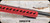 Consign - Anschutz - 22LR - Model 1727 Match - Fire Red AI AT-X Chassis w/AI Picatinny 30 MOA Rail(.900) 23"Heavy Barrel, Threaded 5020 Match Trigger (Mfg# 016793AIFR) - New, unfired in original case - c/w Picatinny Bipod mount