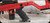 Consign - Anschutz - 22LR - Model 1727 Match - Fire Red AI AT-X Chassis w/AI Picatinny 30 MOA Rail(.900) 23"Heavy Barrel, Threaded 5020 Match Trigger (Mfg# 016793AIFR) - New, unfired in original case - c/w Picatinny Bipod mount