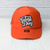 Orange Trucker Cap With FOOTBALL Embroidered Game Day Patch