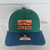 Spruce Green and Navy Low Profile Richardson Trucker Hat With TAN Take A Hike Leather Patch