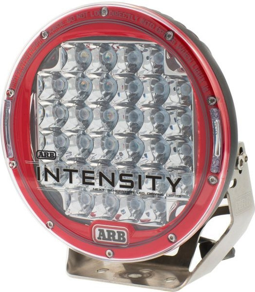 These new Intensity LED lamps from ARB utilize a pressure die cast aluminum lightweight body that also acts as a heat sink where the removable LED circuit board containing 32 SMD LEDs mounts into the front face. The Hybrid Optics (reflector & lens) are then located within a retaining bezel and held in place by the super strong polycarbonate lens. With the light assembly weighing close to 6.75 lbs, a mounting system was designed from TIG welded 304 grade stainless steel to ensure integrity under the harshest conditions. These amazing lights feature a 6500k or Kelvin color with an output of 8200 lumens. With a life span of 50,000+ hours and an IP68 Certification you will not find a better and more powerful auxiliary light. In 2009 ARB engineers started a development program to produce an ARB driving light with a completely new design incorporating the latest LED technologies. Unlike light bars that were growing in popularity, ARB required a light that was compatible with current bull bar designs and traditional driving light mounting points. They also needed to be a legal fitment which, in many states, light bars are not. Many ARB customers prefer a combination of a spot and spread driving light due to the various driving conditions encountered in general off-roading. Most LED light bars on the market are considered great lights for slower off road driving where the ability to see great distances is not so critical. For ARBs new light to compete with the best the market can offer in Halogen and HID lighting, it needed to give not only the broad flood beam associated with light bars but also a spot beam with the ability to penetrate longer distances. Integral to the design was the need for the light to be robust and suited to the conditions encountered off-road like the constant vibrations of corrugated roads, animal strikes and the ability to be submersed. With the general abuse that off-road driving can dish out, the light also needed to be serviceable. During the development stage, many advances in LED and optics design meant that the LED array and circuitry changed numerous times. With many tens of thousands to be invested in tooling, this meant that the design of the light body needed to be future proofed so that further advances in technology would not require re-tooling. The final design utilises a pressure die cast aluminium light body that acts as a heat sink where the removable LED circuit board containing SMD LEDs mounts into the front face. The Hybrid Optics (reflector & lens) are then located within a retaining bezel and held in place by the polycarbonate lens. Any future advances in technology therefore only require changes to the circuit board and optics. Although SMD (surface mount) LEDs run very cool in comparison to traditional resin encased LEDs, the circuitry and associated components that power them get quite hot, requiring large heat sinks and cooling fins with increased surface area to draw the heat away from the circuit board. This required that the light body be manufactured from aluminium but due to its round shape, a pressure cast aluminium body was preferable over an alloy extrusion used in light bars. With the light assembly weighing close to 6.75 lbs, a mounting system was designed from TIG welded 304 grade stainless steel to ensure integrity under the harshest conditions. Stainless steel offers considerable strength over other designs and with a requirement to handle vibration, prototypes of the new light undertook Military Specification vibration testing on a shaker table by an approved facility in Melbourne. Attached to an ARB bull bar the shaker table put both the light and bar through severe testing, with both the light and bar mounts resisting fatigue and passing the test. Further testing was then carried out to ensure the light was waterproof, with the light achieving a rating of IP68. IP ratings are an international code giving an Ingress Protection Rating and classifies in this case the level of protection given to an electrical enclosure. The 6 in the code relates to solid particle protection and is the highest rating: Dust tight-No ingress of dust; complete protection against contact. The 8 relates to liquid ingress protection and is also the highest rating: Immersion beyond 3.25 ft. - The equipment is suitable for continuous immersion in water under conditions which shall be specified by the manufacturer. To finish the outer surfaces of the light to ensure durability under the harshest conditions, the aluminium body is finished in a textured polyester powder coat that passes the ISO7253 3000 hour salt spray test. The lens retaining bezel is finished in a UV resistant red two pack automotive paint. This combined with the 304 stainless steel mount makes the ARB Intensity light extremely corrosion resistant. Performance of the light can only be described as intense and hence where it derives the name ARB Intensity. At 6500K, the color temperature of the LEDs is as close to daylight as possible and with 32 LEDs per light producing a broad beam, even on spot versions the lights illuminate everything in the drivers forward field of view. No longer does the driver find themselves straining to see beyond the edge of the beam, hence reducing fatigue. ARB Intensity LED lights are sold separately as either a spot or flood beam. A new wiring loom has been developed that includes waterproof Deutsch DT-06 connectors and is available by ordering P/No 3500520.