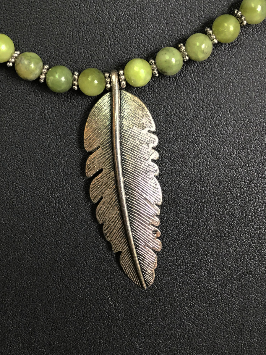 Jade, Feather, and Large Crystal Necklace