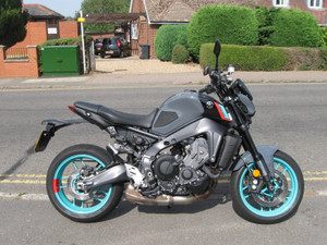 Yamaha MT-09. Just 1263 miles with luggage, screen, heated grips. 