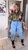Model wearing size medium