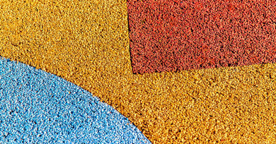 Combining Rubber Surfacing With Modern Playground Components