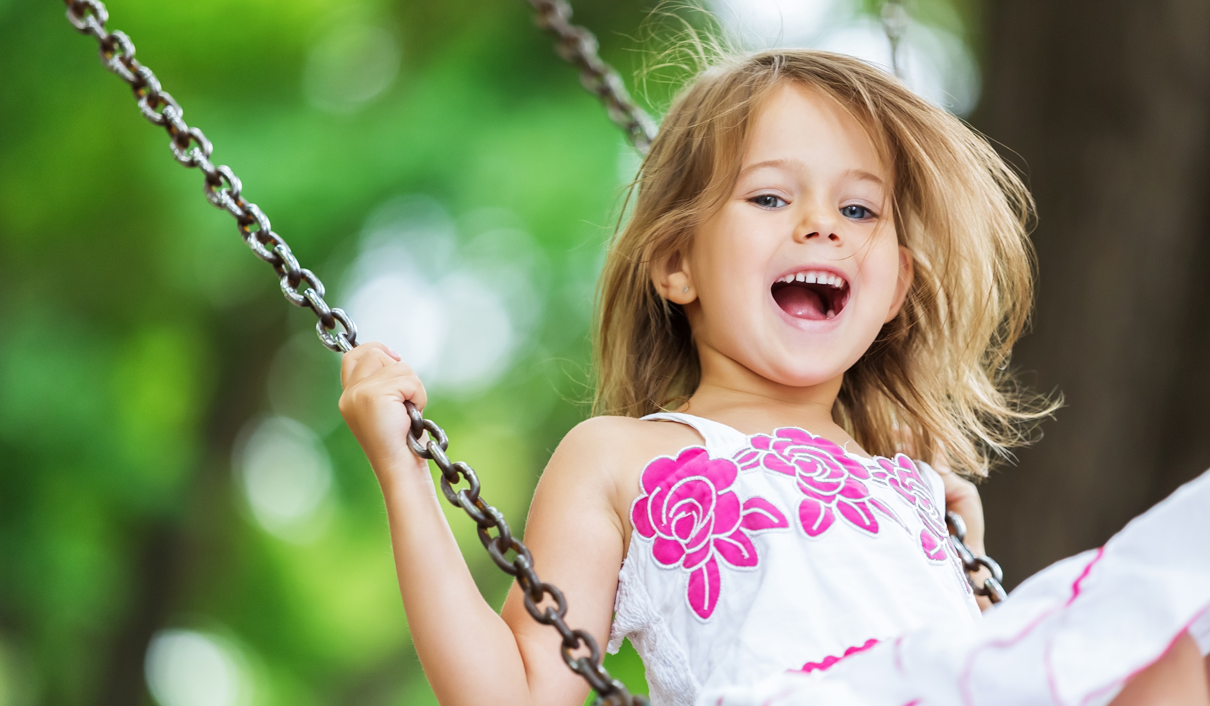 Child On Swing Stock Image