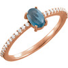 14 Karat Rose Gold 6x4mm Oval Cabochon London Blue Topaz and 0.12 Carat Diamond Ring