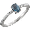 Platinum 6x4mm Oval Cabochon London Blue Topaz and 0.12 Carat Diamond Ring