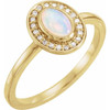 14 Karat Yellow Gold Fire Opal and .08 Carat Diamond Halo Style Ring