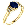 14 Karat Yellow Gold  Lab Grown Oval Blue Sapphire and .05 Carat Diamond Ring