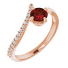 14 Karat Rose Gold Mozambique Garnet and 0.10 Carat Diamond Bypass Ring