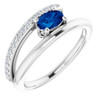 14 Karat White Gold Grown Blue Sapphire and .125 Carat Diamond Ring
