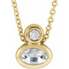 14 Karat Yellow Gold 5x3 mm Oval White Sapphire and .03 Carat Diamond 16 inch Necklace