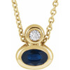 14 Karat Yellow Gold 5x3 mm Oval Blue Sapphire and .03 Carat Diamond 16 inch Necklace
