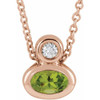 14 Karat Rose Gold 5x3 mm Oval  Peridot and .03 Carat Diamond 16 inch Necklace