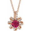 14 Karat Rose Gold Lab Grown Ruby and .07 Carat Diamond Halo Style 16 inch Necklace