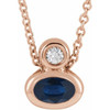 14 Karat Rose Gold 5x3 mm Oval  Blue Sapphire and .03 Carat Diamond 16 inch Necklace