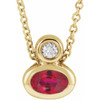 14 Karat Yellow Gold 5x3 mm Oval Ruby and .03 Carat Diamond 16 inch Necklace