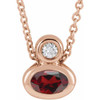 14 Karat Rose Gold 5x3 mm Oval  Mozambique Garnet and .03 Carat Diamond 16 inch Necklace