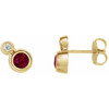 Created Ruby Earrings in 14 Karat Yellow Gold Created Ruby and 0.13 Carat Diamond Earrings