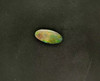 5.60 Carat Black Opal with Red Orange Green Play - Oval Gem - $4561 USD