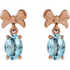 14 Karat Rose Gold 7x5 mm Natural Sky Blue Topaz Bow Earrings