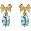 14K Yellow 7x5 mm Natural Sky Blue Topaz Bow Earrings