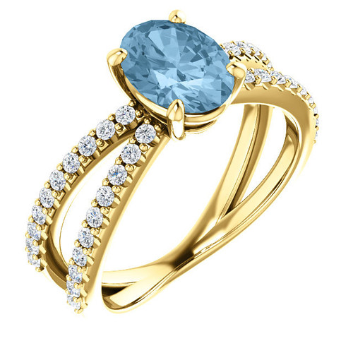14 Karat Yellow Gold Sky Blue Topaz and 0.33 Carat Diamond Ring