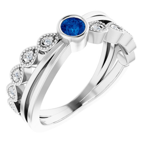 Natural Sapphire set in 14 Karat White Gold and .05 Carat Diamond Ring