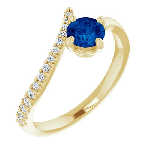 Lab Created Sapphire Ring in 14 Karat Yellow Gold Lab Created  Sapphire & 0.10 Carat Diamond Bypass Ring