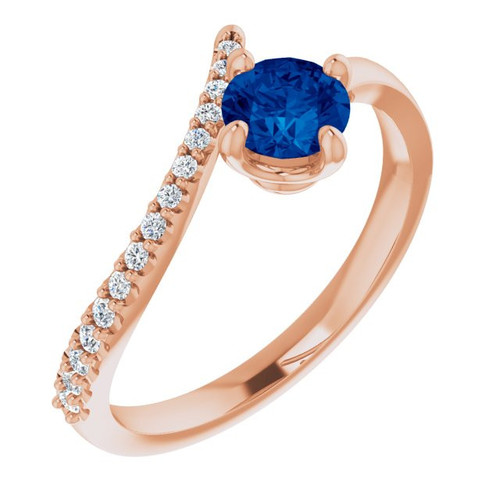Lab Blue Sapphire set 14 Karat Rose Gold Lab Sapphire and 0.10 Carat Diamond Bypass Ring