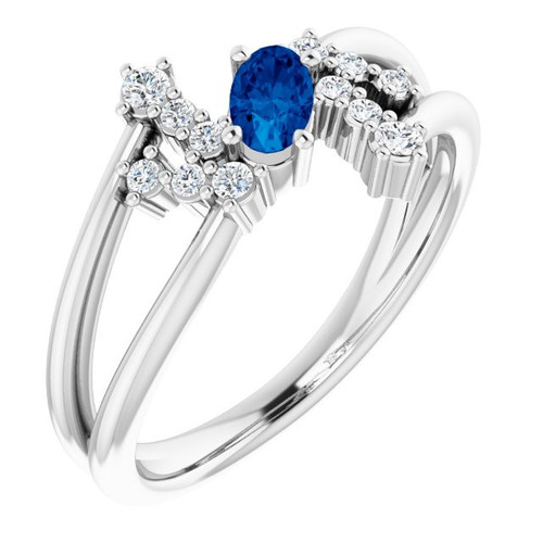 14 Karat White Gold Blue Sapphire and .125 Carat Diamond Bypass Ring