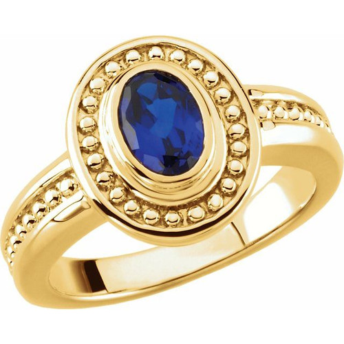 Bezel Set Ring Mounting in 18 Karat Yellow Gold for Oval Stone..