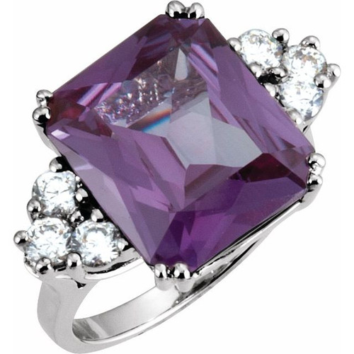 Accented Ring Mounting in Platinum for Emerald cut Stone..