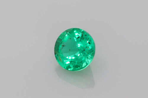 Round Emerald Gemstone – 0.62 Carat, Vivid Rich Green