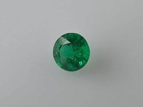 Round Emerald Gemstone 0.66 Carat Vivid Intense