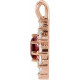 14 Karat Rose Gold Mozambique Garnet and 0.60 carat Diamond Halo Style Pendant